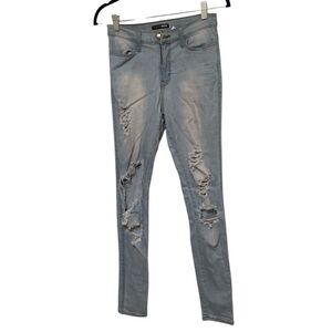 Size 7 women’s ripped distressed skinny jeans